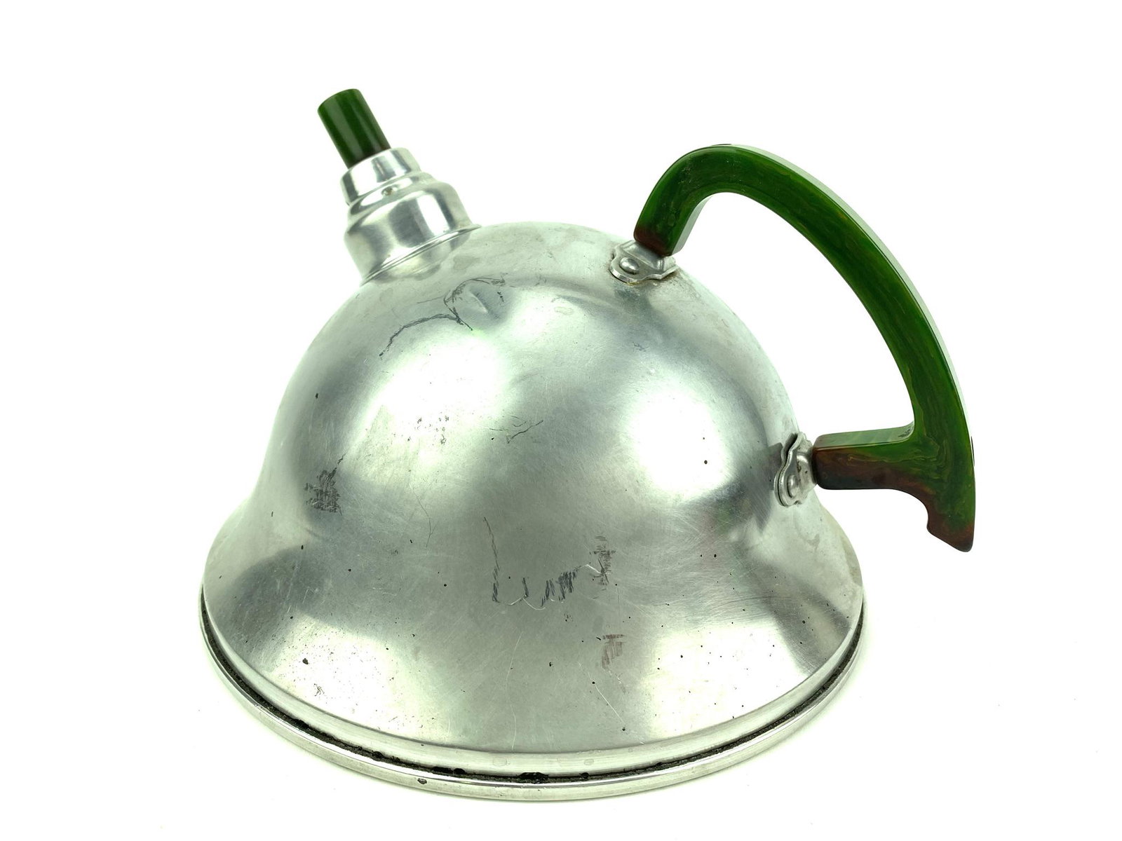 Art Deco Bakelite Handle Aluminum Teapot Kettle: Green and brown Bakelite with aluminum body tea kettle marked Pure Aluminum made in USA on bottom. Measures 6 1/2" x 8 1/4" diameter.