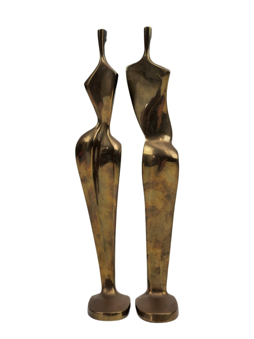 Itzik Ben Shalom Bronze Modernist Nude Figures: Man and Woman pair of bronze nude figural 28/500 limited sculptures by Itzik Ben Shalom signed on base. Measures 10 1/4" x 3 1/2" x 2"