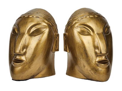 Art Deco Modernist Tribal Face Bookends: Art Seco modernist bookends in metal with gold finish. Unknown maker or artist. Measure 6 1/2" x 5" x 3 1/2"