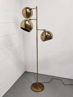 Koch & Lowy Mid Century Brass Eyeball Floor Lamp: Three light weighted eyeball floor lamp in brass by Koch & Lowy. Measures 58 1/4" x 24" with 7 1/4" lights.