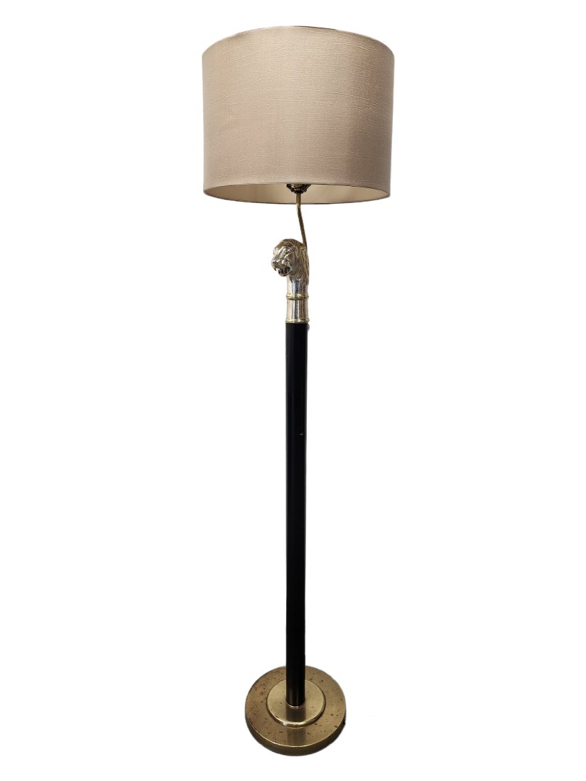 Frederick Cooper Lion Scepter Floor Lamp: Vintage Brass and black metal floor lamp with lion head scepter. Appears to be chrome or silver plated. Marked Frederick Cooper Chicago on socket. Measures 62 1/2" tall with a 6 1/2" lion and 11" step