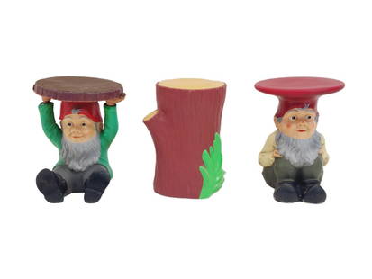 Philippe Starck for Kartell Garden Gnome Stool Table Set: Group of three Kartell Garden Gnomes Table, Stool and tree stump outdoor decor by Philippe Starck. Stamped on bottom. Measures about 17" tall x 13" wide each.