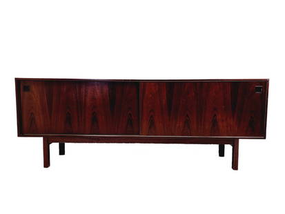 Mid Century Danish Modern Rosewood Sideboard Credenza Designed by Gunni Omann 1960s: Large Danish modern rosewood sideboard designed by Gunni Omann circa 1960 with partial original label on backside. Multiple shelves and green felt lined drawers with two sliding doors. Measures