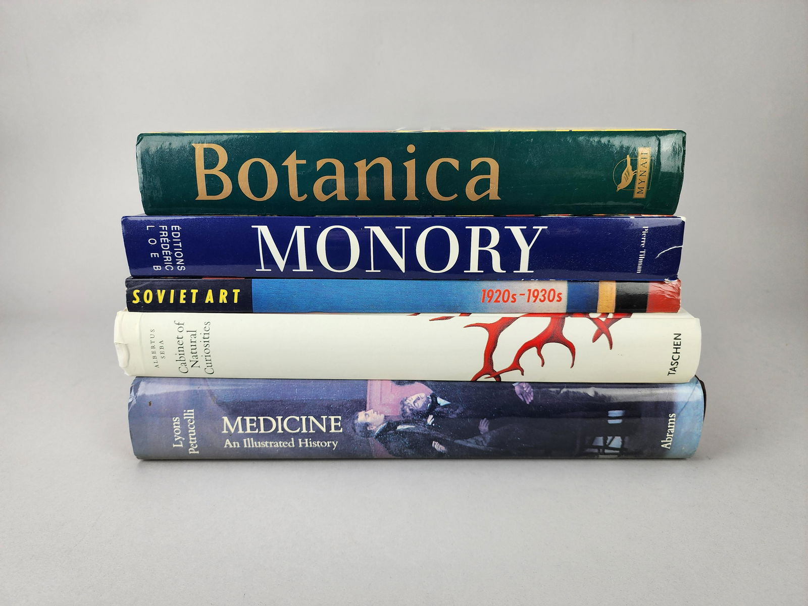 Coffee Table Book Group: Lot of Estate coffee table books including, Botanica, Monory, Soviet Art, Cabinet of Natural Curiosities and Medicine: An Illustrated History. Measurement of largest book - 11" x 13 1/2".