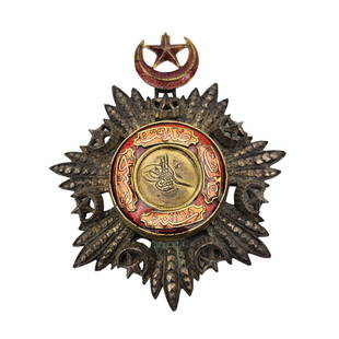 Antique 19th Century Silver Enamel Medjidie Commander Badge Medal: Order of the Medjidie Commander Badge in Silver with ruby red enamel and gold center. Measures 3" x 2 1/2"