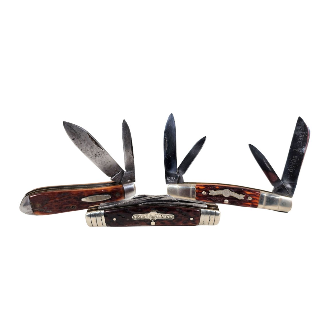 Vintage Boker Tree Brand, Olde Stag Pocket Knife Lot: Lot of three vintage Boker pocket knives. One stag and two bone handle. Olde Stag Tree Brand 18849-70113 4 blade Tree Brand Solingen Germany 4 blade H. Boker & Co's Improved Cutlery Tree Logo 2 blade.
