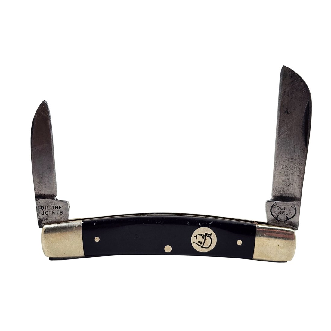 Vintage Buck Creek Miner Pocket Knife 2 Blade: Vintage Buck Creek 2 blade pocket knife with miner logo and black handle. Measures 3 1/2" closed.