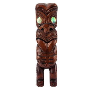 Vintage Maori Carved Statue Sculpture: Vintage Maori carved figure deity god with abalone shell inlay eyes. Signed by artist. Measures 13 5/8" x 3 3/4".