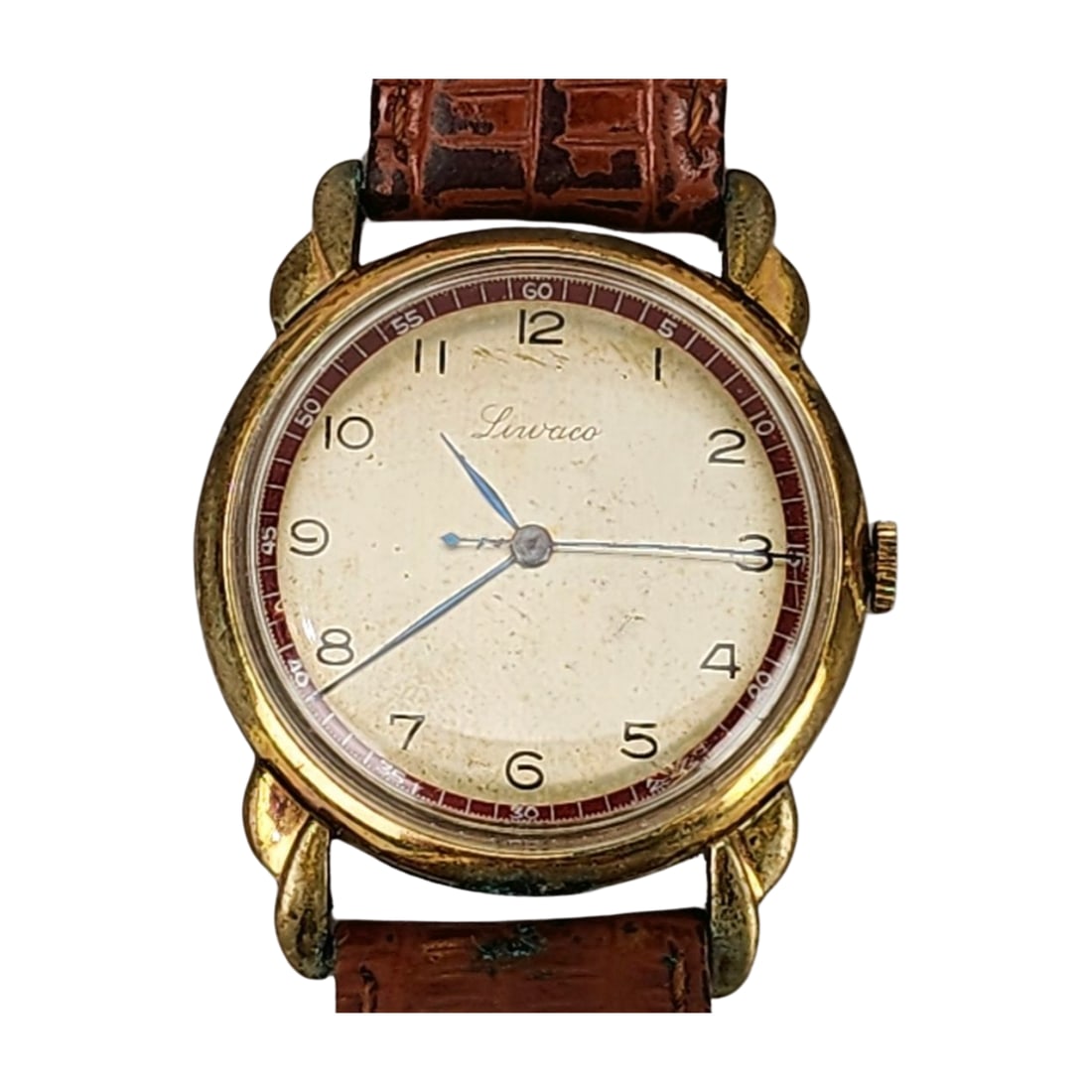 LIWACO 1960 Swiss Made Wristwatch: Vintage 1960 wind up wristwatch by LIWACO with leather band. Measures 33m dial with 9" band.