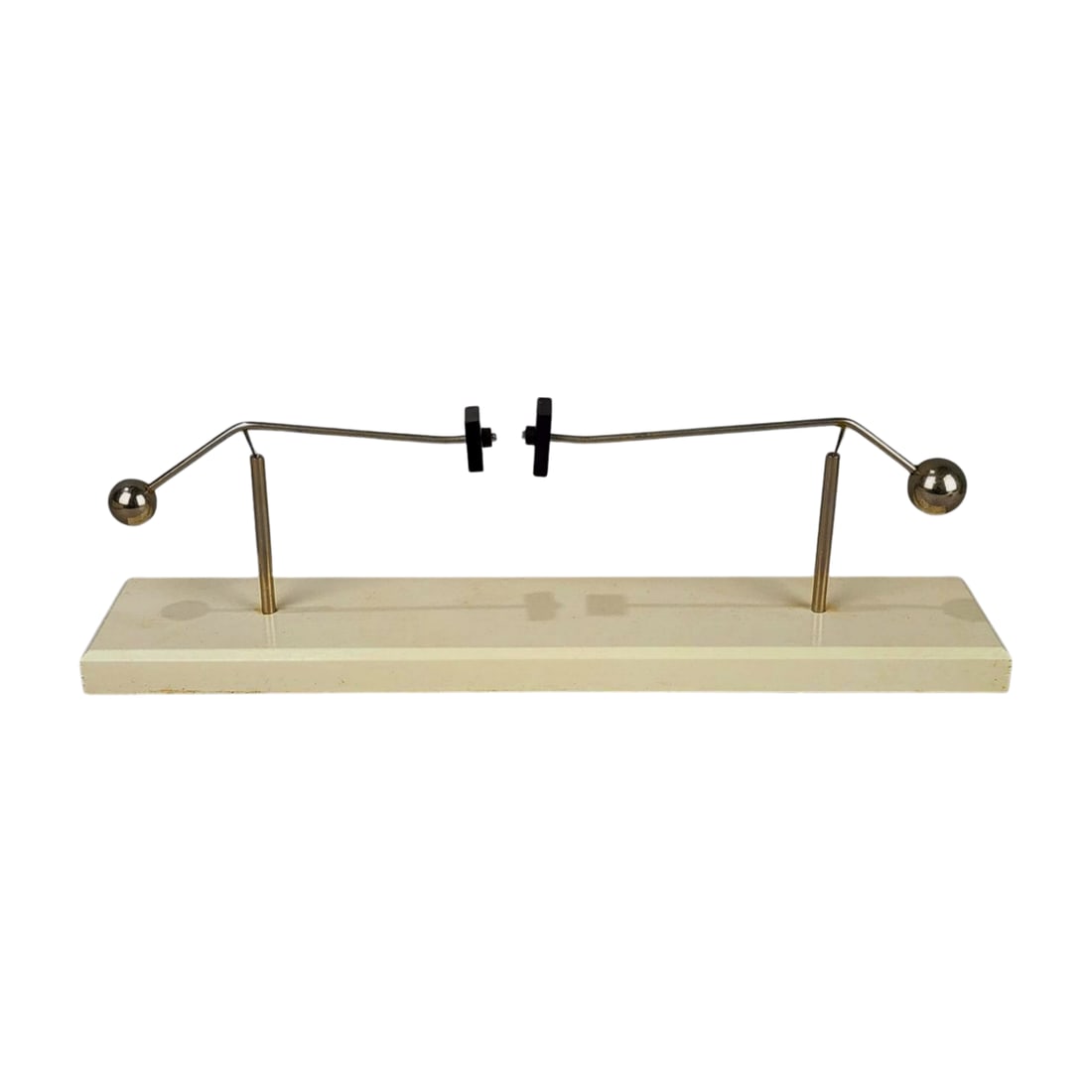 Dodo Designs Kinetic Flirt Sculpture w/Box: Made in England, this unique Dodo Designs Kinetic Flirt sculpture features a metal construction with a wood stand. Includes original box and retains the label on the bottom. Measures 4" x 12" x 2 1/2"