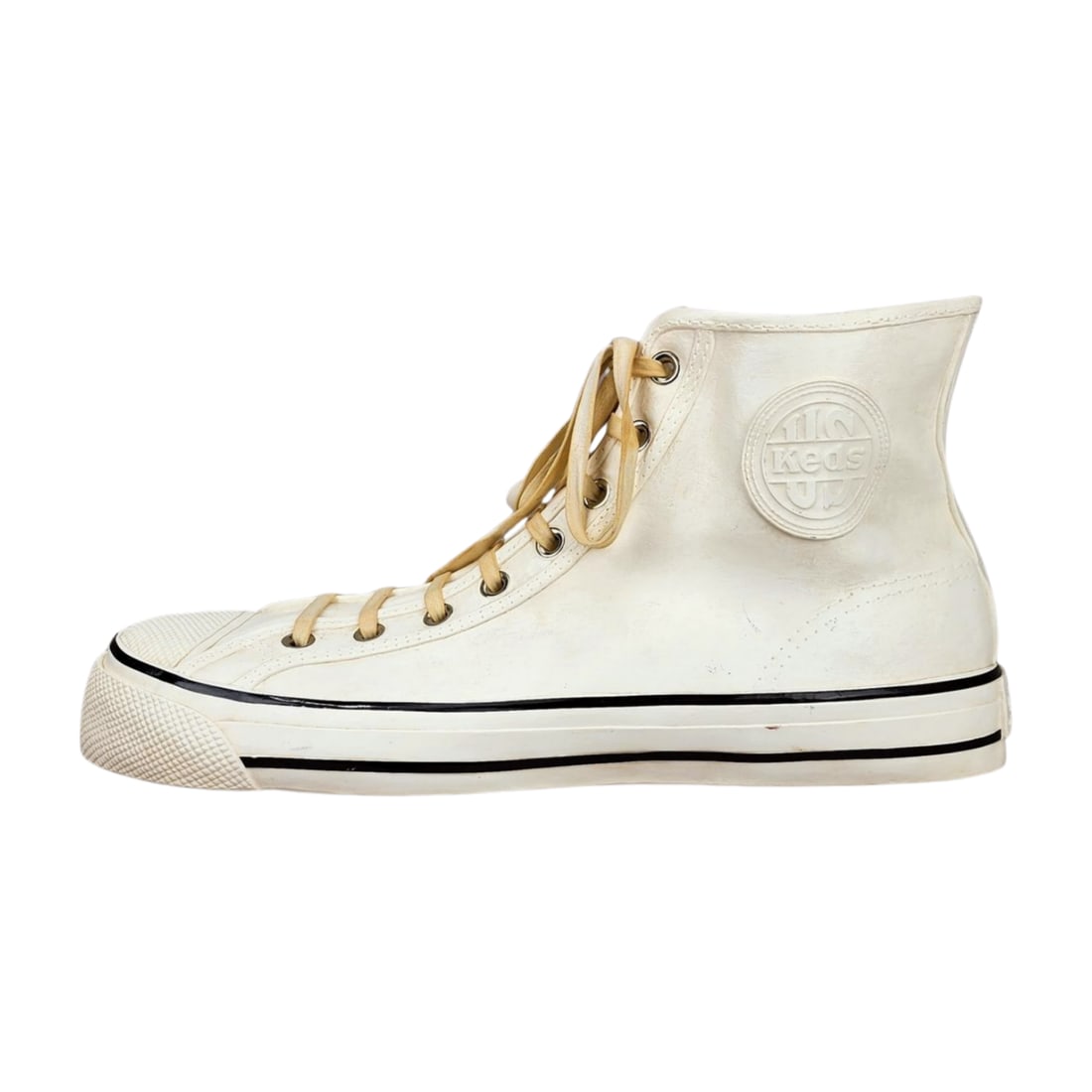 Vintage Keds Advertising Shoe Display: Vintage Keds high-top shoe display made of plastic resin with cloth laces. Features embossed "Keds Up" logo on the side. Measures 11" x 22 1/2" x 7 3/4".