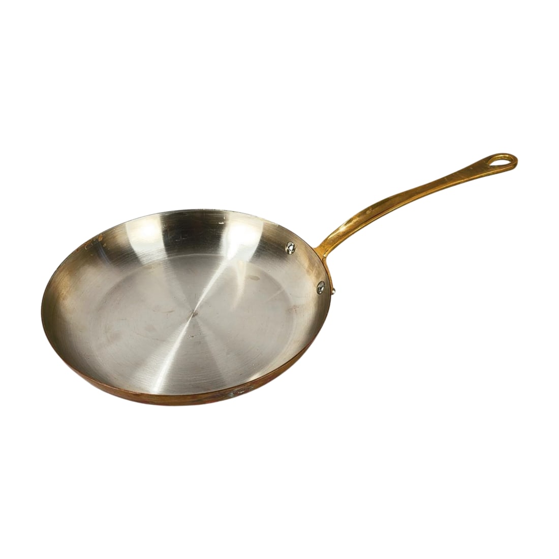 Mauviel 1830 Copper 10" Crepe Fry Pan with Brass Handle: French-made Mauviel 1830 copper fry pan with a stainless steel interior and riveted brass handle. Marked on the base with "Mauviel 1830" and "Made in France." Measurements: 1 3/4" x 10 1/4" x 9 1/2" h