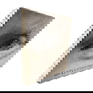 American Photographer Robert Mapplethorpe Coffee Table Book: Large coffee table book with sleeve, "Mapplethorpe," a monograph of work by American Photographer Robert Mapplethorpe. Robert Mapplethorpe (1946-1989) was known for black and white erotic photography,