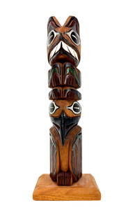 L. Rudick Northwest Coast Carved Cedar Totem: Vintage First Nation, Native American Northwest coast carved totem in cedar by artist Larry Rudick. Purchased from Ye Olde Curiosity Shop. Measures 9" x 3 1/4" x 2".
