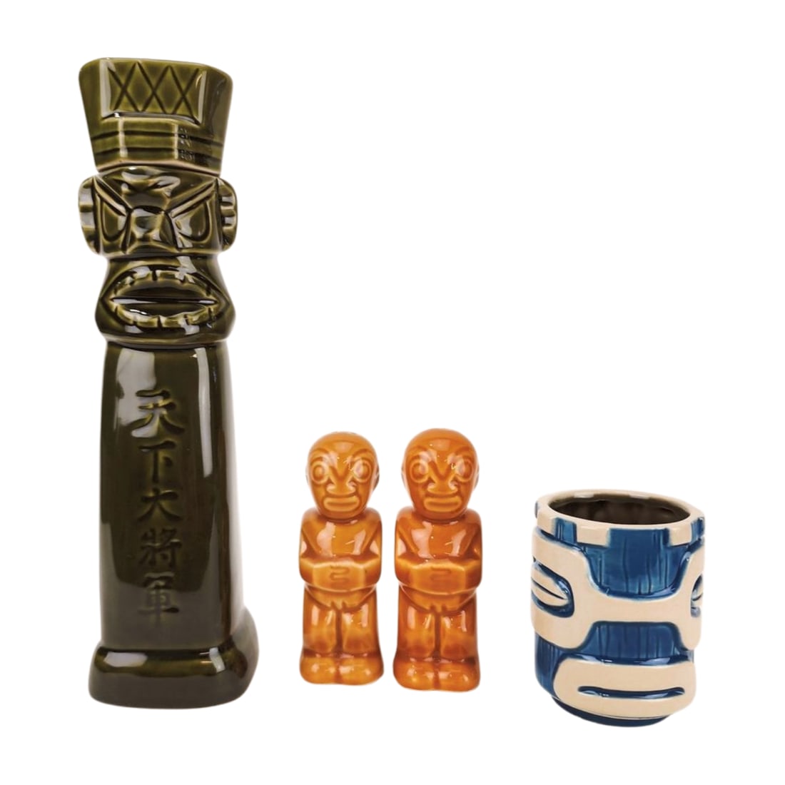 Tiki Mug, Decanter & Salt/ Pepper Shakers Lot: Lot of various ceramic Tiki items including a Munktiki Imports mug, Trader Vic's vintage salt & pepper shakers and a made in Japan decanter 1988.