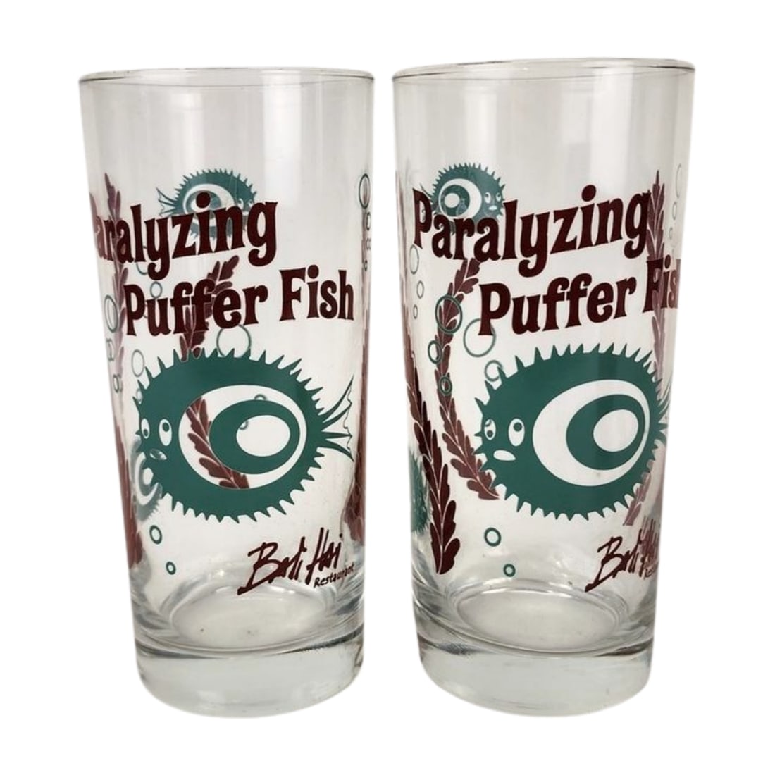 Bali Hai 'Paralyzing Puffer Fish' Tiki Glasses: Pair of matching Bali Hai "Paralyzing Puffer Fish" Cocktail glasses. Measures 6 1/4" x 3" each.