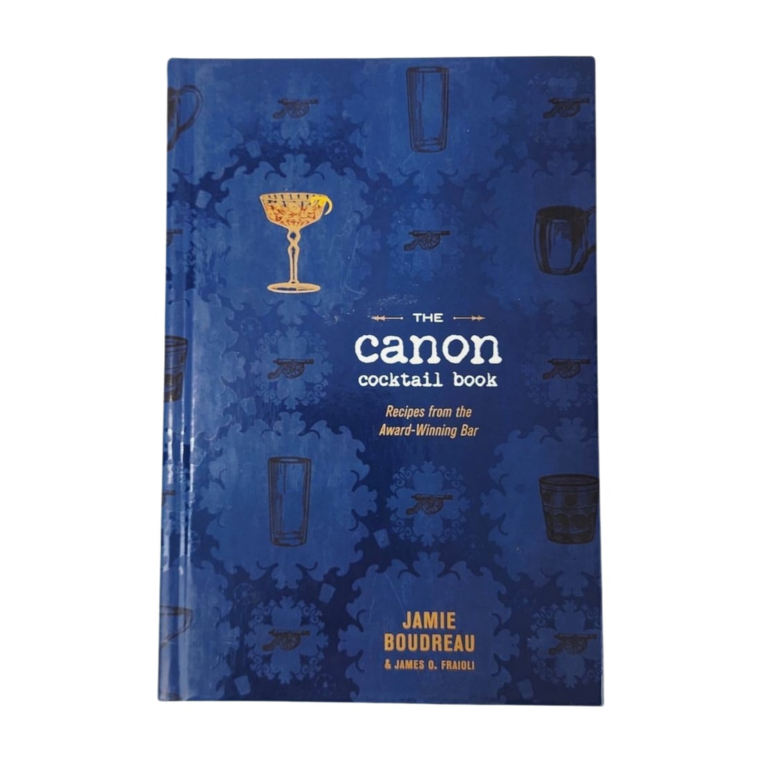 The Canon Cocktail Book: Recipes from Jamie Boudreau & James O. Fraioli: The Canon Cocktail Book: Recipes from the Award-Winning Bar by Jamie Boudreau and James O. Fraioli, an essential guide book for cocktail enthusiasts.