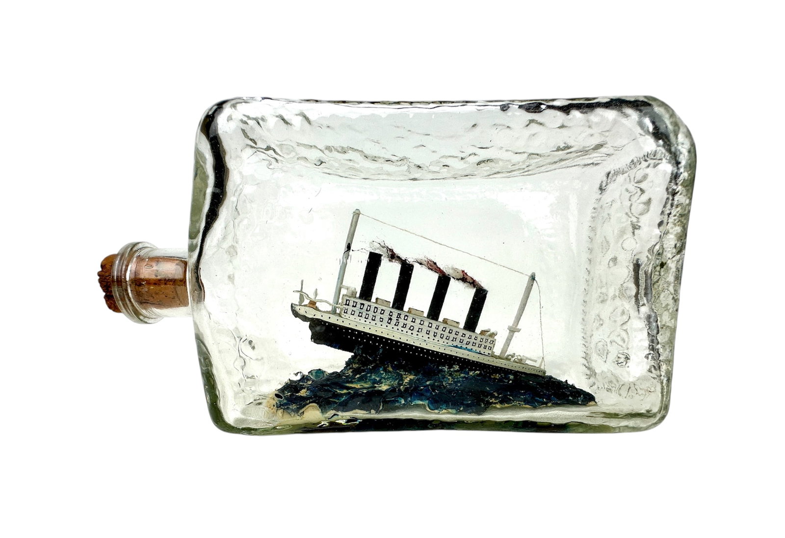 Winson Morrill (1924-2018) Mass., Titanic Ship In Bottle: Vintage ship in bottle by well known Massachusetts artist Winson Haywood Morrill. Mr. Morrill created over 7,000 ships in bottles. Bottom signed under glass. Measures 8"w x 2.75"d x 4.25"t.