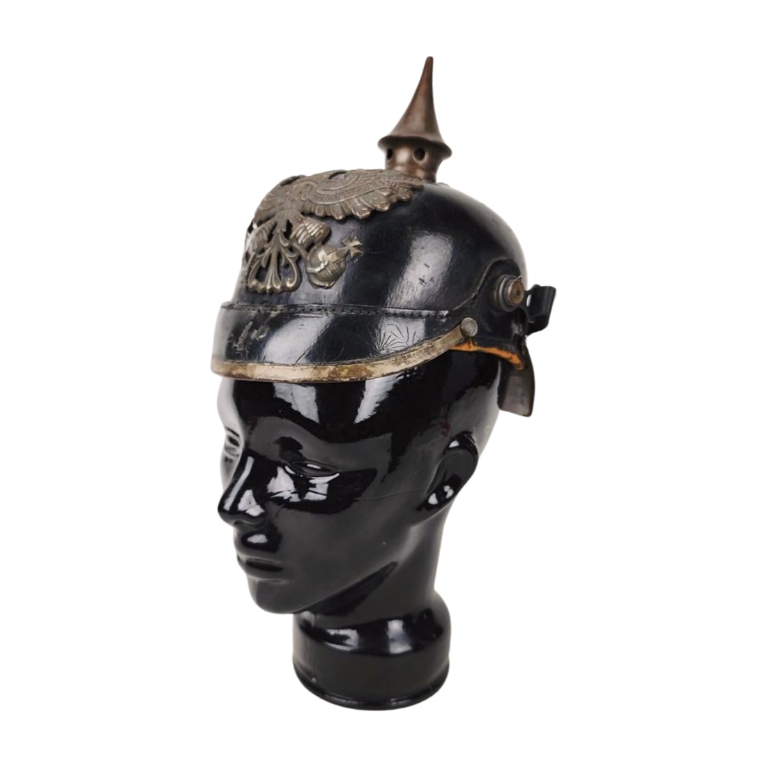 German Imperial WWI 1916 Pickelhaube Spike Helmet: Hardened leather with metal fittings German Military spike helmet. Model head not inlcuded. Measure 8 1/2" x 10" x 6".