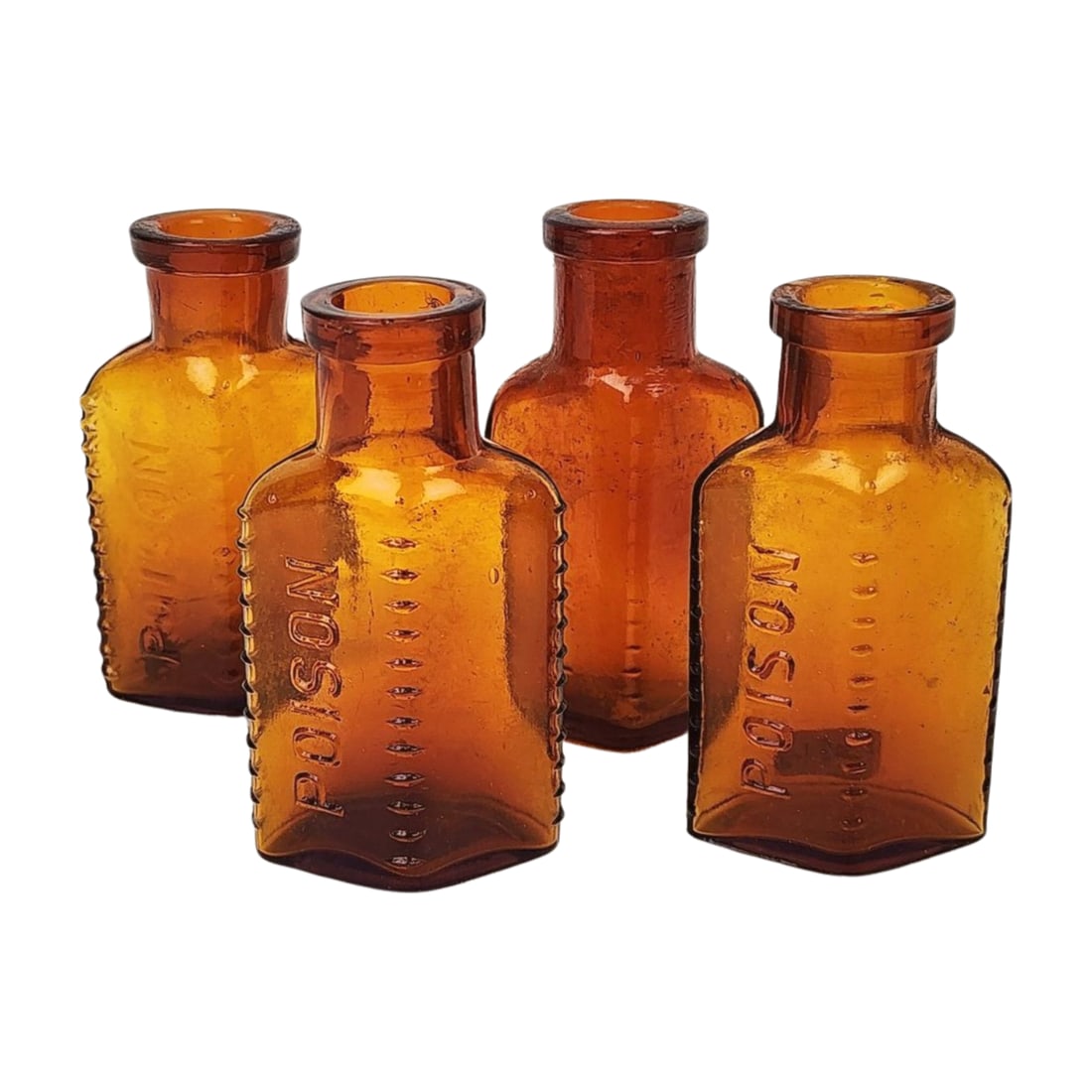Antique Group of 4 Brown Glass Poison Bottles: Group of 4 antique brown empty poison bottles. Measures 3 5/8 "x 2 1/4" each.