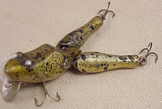 What a Frog! Jointed Wooden Lure: What a Frog! Vintage Jointed Wooden Lure, very good condition, paint chip by eye. 3 1/2 inches long.
