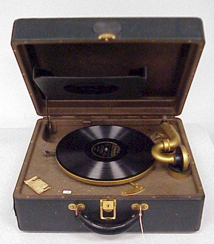 Vintage Victrola Record Player-Orthophonic: Vintage Victrola Record Player-Labeled: "Victor Orthophonic" Victor Talking Machine Co., Camden, N.J. Very Good condition, corners on cover are split. Stands 7 inches tall, 16 1/2 inches wide and 17 i