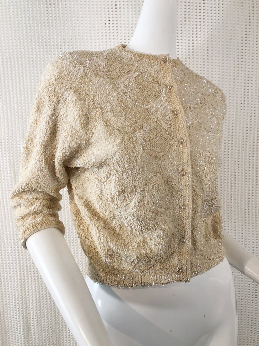 1950s Bonnie Wong Ivory Sequin and Beaded Sweater: 1950s Bonnie Wong ivory sequined and beaded sweater: Angora and wool, hand-beaded in Hong Kong with a scaled pattern. Lined.
