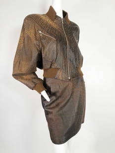 1980s North Beach Leather Brown Skirt & Bomber Ensemble: 1980s Michael Hoban for North Beach Leather distressed natural brown leather mini and bomber jacket ensemble. Padded shoulders and Dolman sleeve styling. Size L.