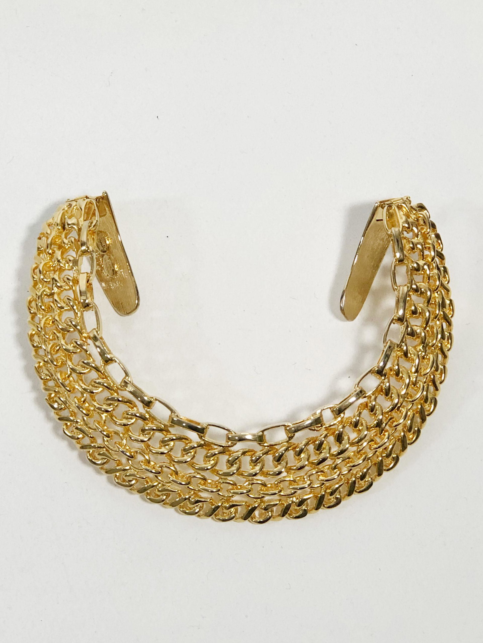 1980 Kenneth J. Lane Gold Link Collar w/ Hinged Panels: 1980 Kenneth J. Lane gold layered chain link collar with fused, fixed links and hinged back panels to put on. Made in USA. 15.25"L x 1.75"W