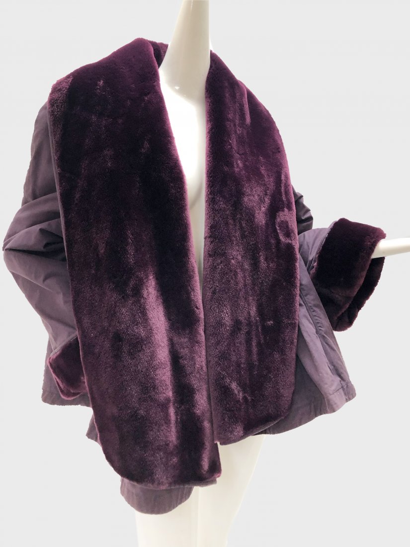 1980 Byblos Mulberry Coat with Faux Fur Lining & Collar: 1980 Byblos mulberry coat with faux fur lining and collar. Two front pockets. Made in Italy. Fits a US size Large. See measurement card for exact fit.