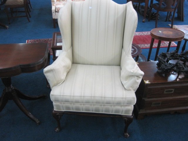 Hickory Chair Company Wingback Chair: Chair sits on a mahogany queen ann base and measures 42"H x 32" W x 26"D. Chair in good condition with light mark on fabric.