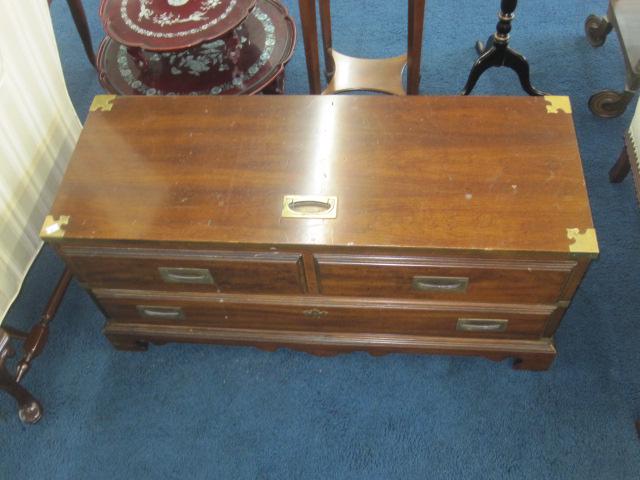Asian Style Blanket Chest: Wooden chest has original brass hardware and mounts. Blanket chest measures 40"W x 20"H x 15"D and is good condition with scratches to top of chest and wear consistent with age.
