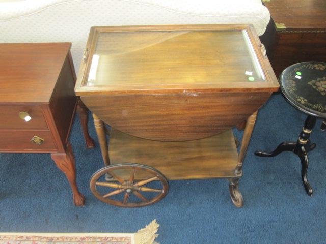1940s Mahogany Serving Cart: Serving cart has 2 drop leaves and serving tray.It measures 29"H x 26"W x 16"H and is in good condition showing minor wear consistent with age.