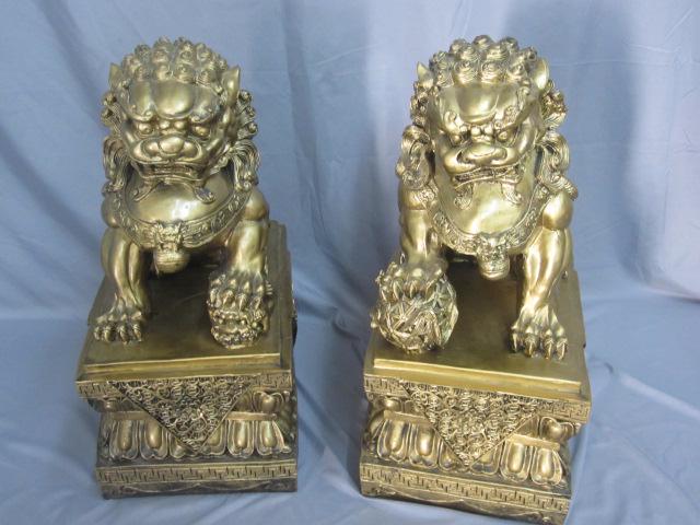 Pair Asian Statuary Foo Dogs: Highly detailed pair of Asian foo dogs. Made of plaster. 21-1/2"Hx10"Wx16"D.
