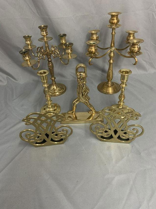 6 Piece Brass Lot, Baldwin & Williamsburg: Lot concsists of Baldwin candlesticks,door stop and candelbra. Plus CW Thomas Jefferson cipher bookends plus. Largets candelbra measures 12"H. No damage noted