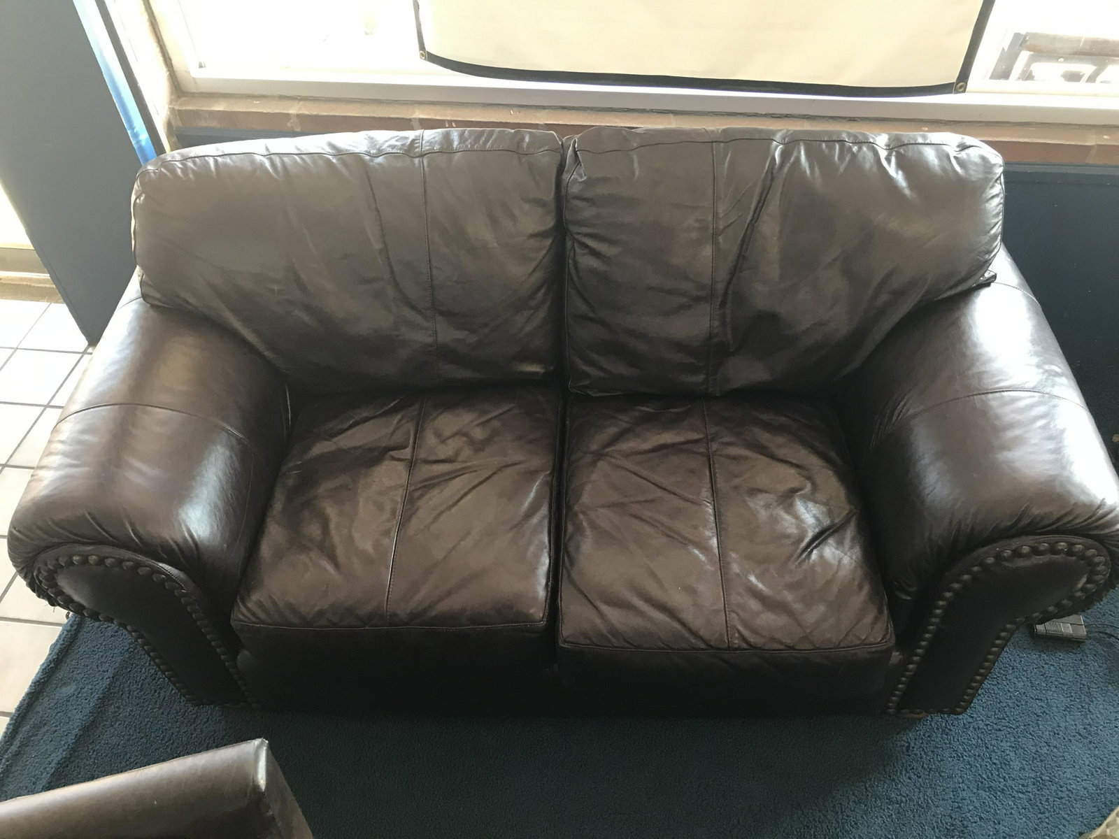 Leather Sofa: 34" H x 70" W x 34" D.