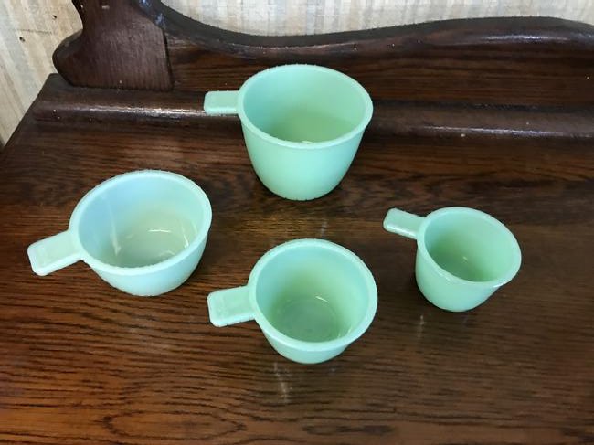 Jadeite Measurers: Largest measures 2 1/2". Four pieces total.