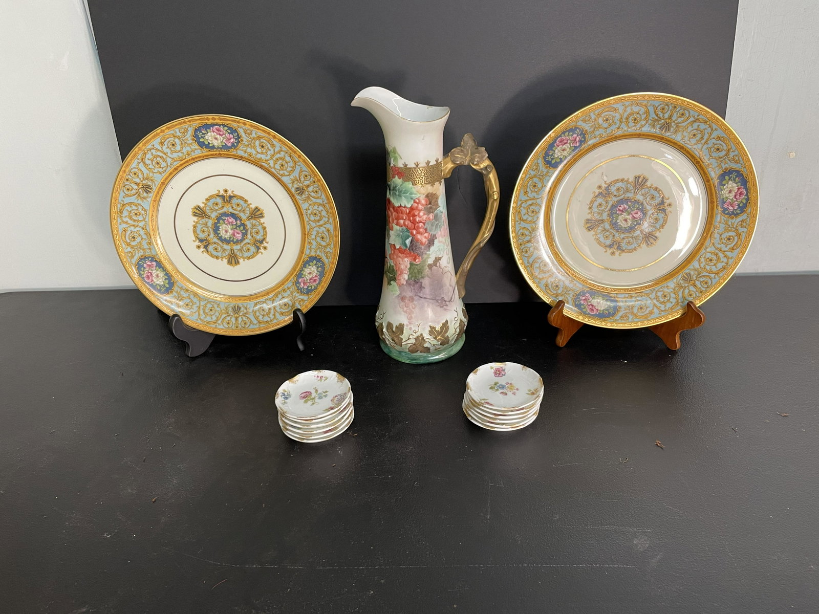 14 Pieces Limoges China: Two dinner plates, 12 butter pats and pitcher. Pitcher 12"H.