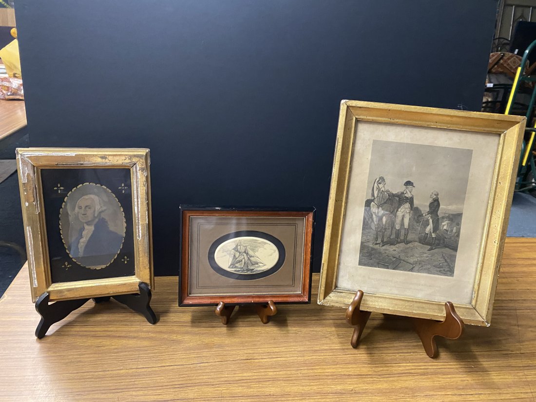 Two Early George Washington Engravings Plus: Largest frame measures 12"H X 10"W and is of first meeting between Washington and Hamilton. Smaller is colored engraving plus a framed piece of decorated scrimshaw.