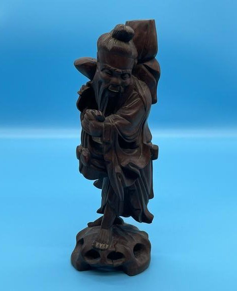 Carved Asian Statue (1 of 3)