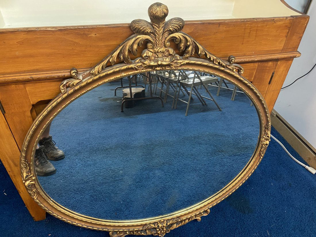 Oval Gilt Mirror: Wood mirror measures 36" X 36"