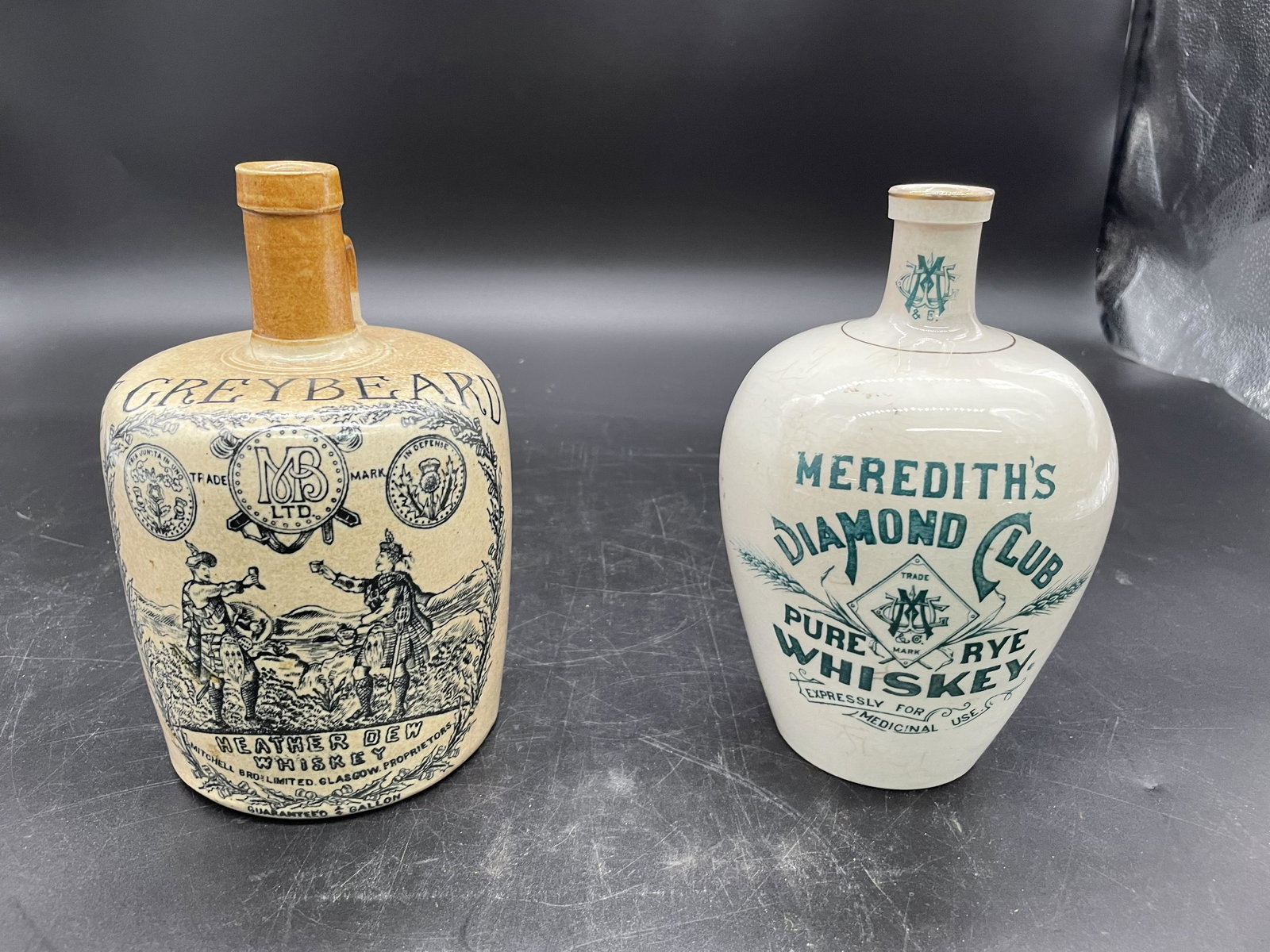 Two Whiskey Advertising Jugs (1 of 4)
