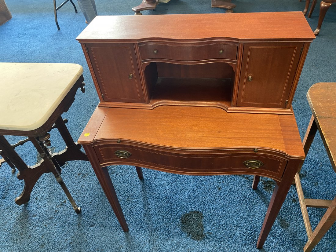 Mahogany Writing Desk with Inlay: Desk measures 41"H X 30"W X 16"D and has line inlay on drawers and doors. Has a pullout writing surface