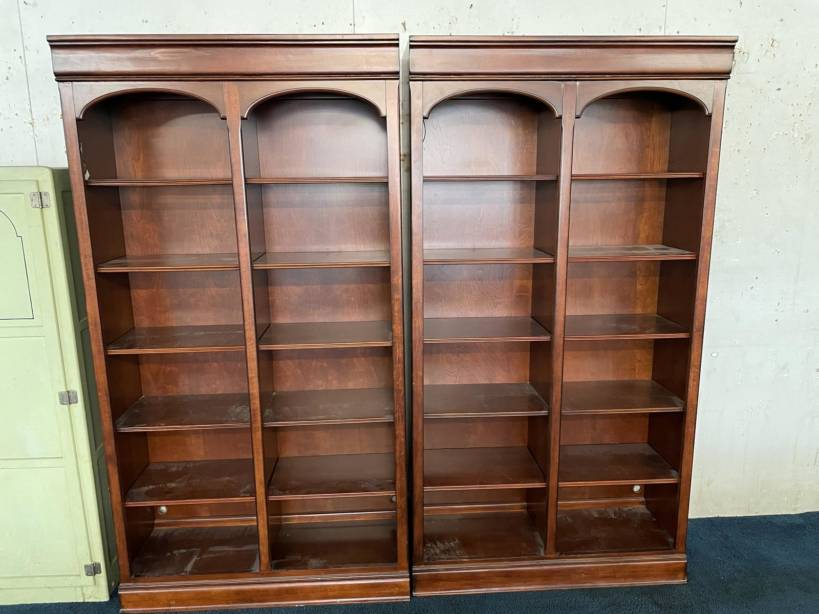 Pair of Cherry Lighted Bookcases: Top shelves are glass. 80"x43"x14".