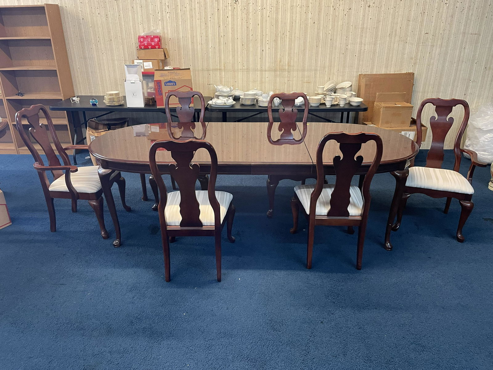 Thomasville Cherry Dining Table and Chairs: Includes six chairs, two armed, also two leaves. Table 64"W with out leaves, leaves 16"W. 30"H.
