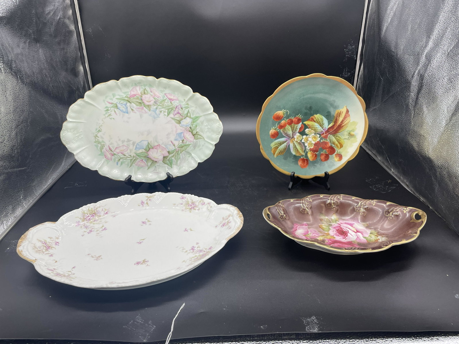 Limoges Plus: Three pieces signed Limoges, plus hand painted Bavarian bowl. Largest 18"W.