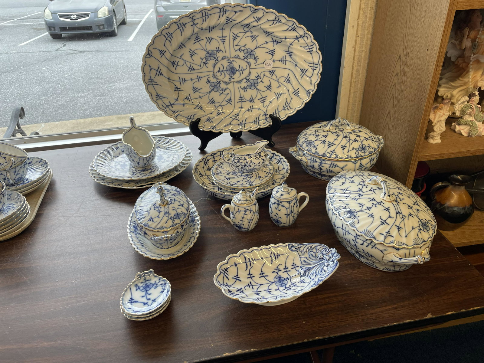 Eighteen Pieces Meissen Blue Onion Style China: Lot mostly consist of serving pieces. Largest measures 19" W.