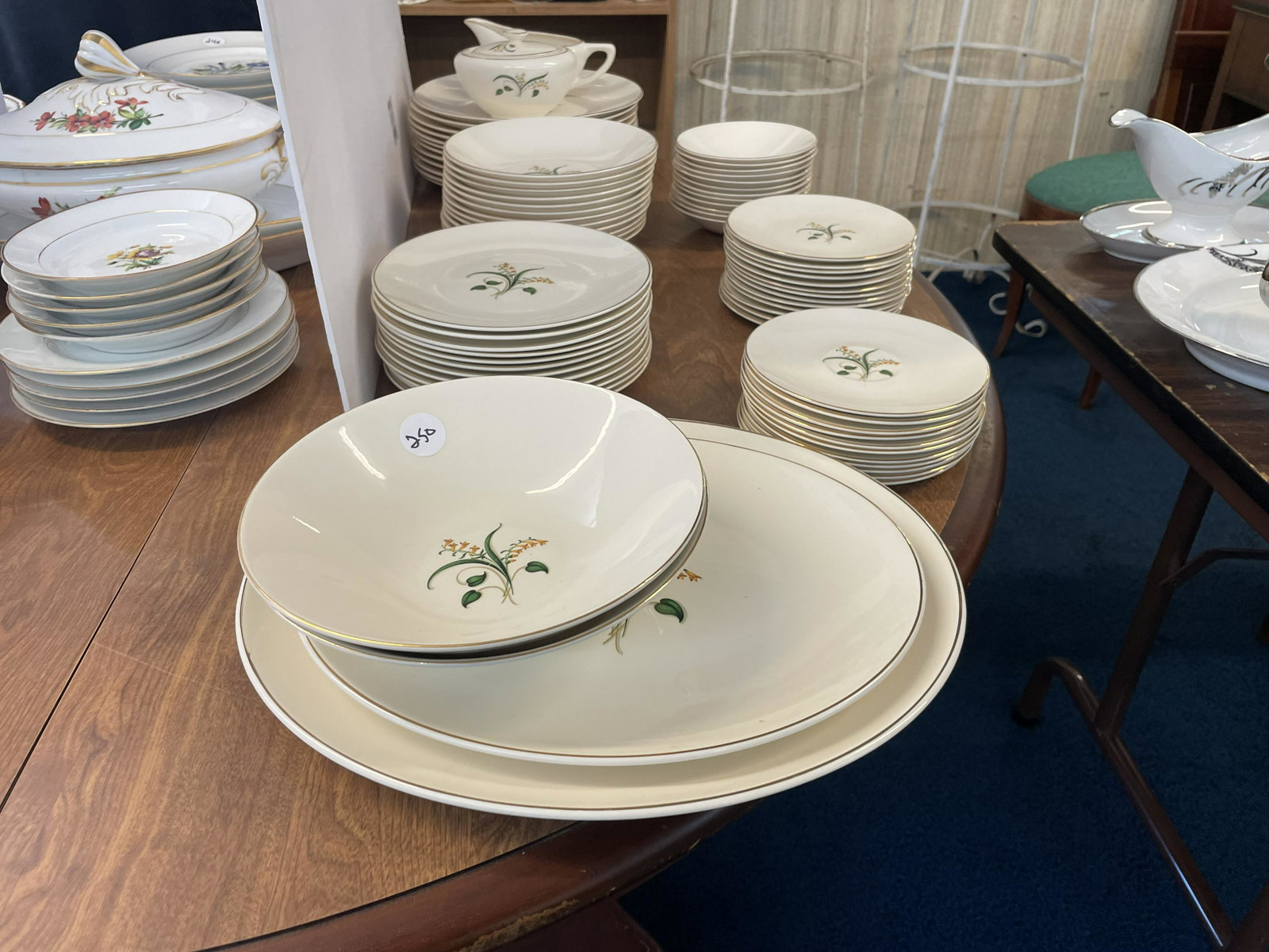 Mid Century Style Dinnerware: Largest measures 14" W. Appears to be a service for 12, set has no cups.