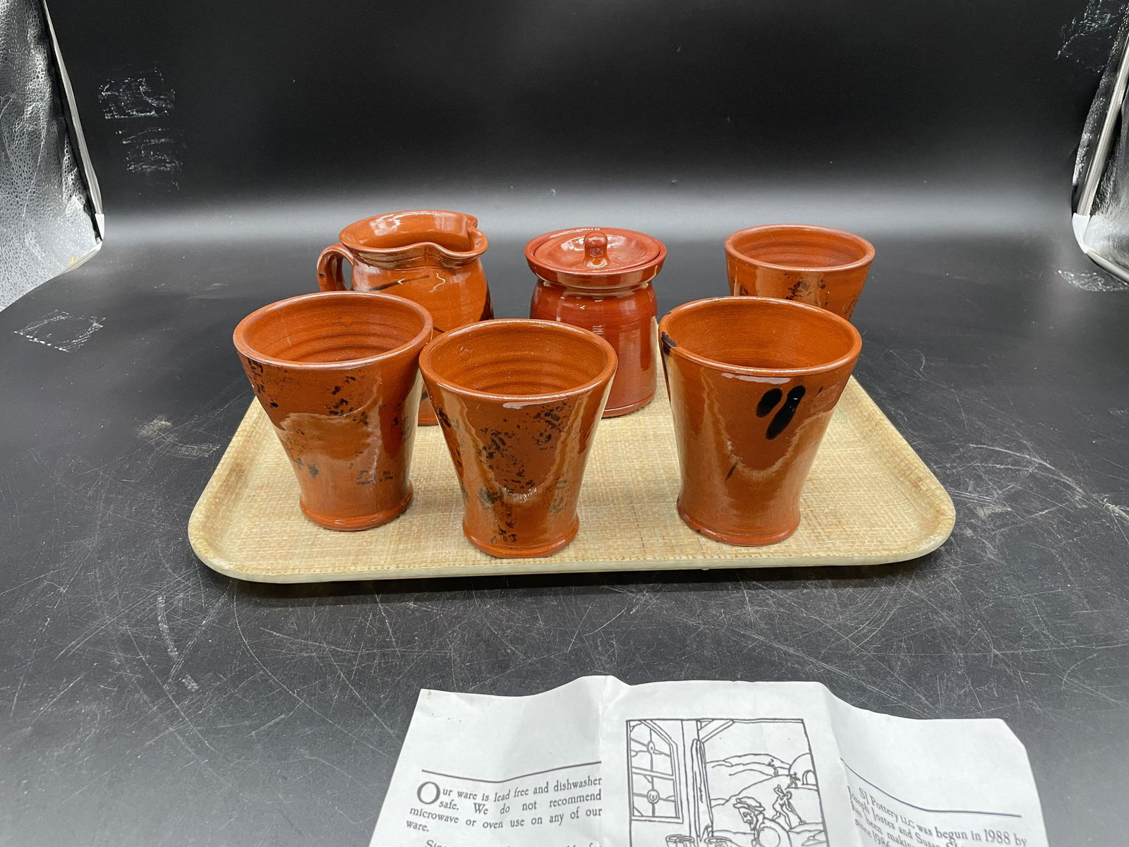 Six Pieces Signed Redware: Signed SJ Pottery. Largest measures 5" H.