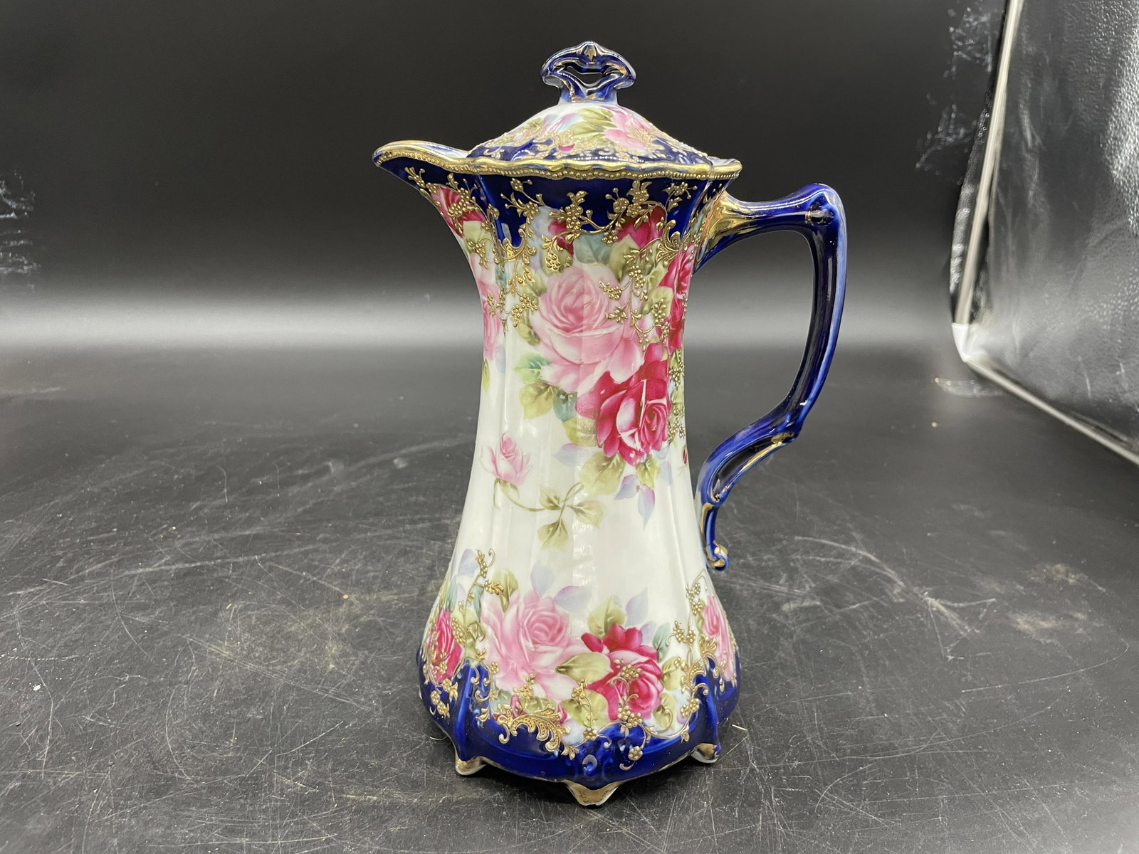 Gold Encrusted Nippon Chocolate Pot: gold encrusted with cobalt and pink rose decoration, footed base. 11"H.